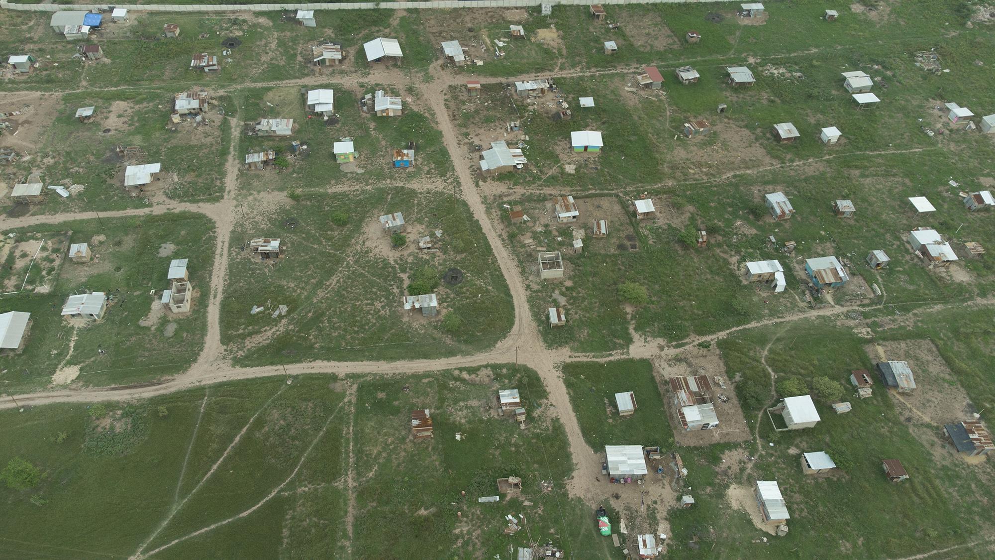 En la comunidad Nueva Esperanza viven unas 250 familias. El lugar fue ocupado por personas de distintos puntos del Valle de Sula. Foto de El Faro Carlos Barrera