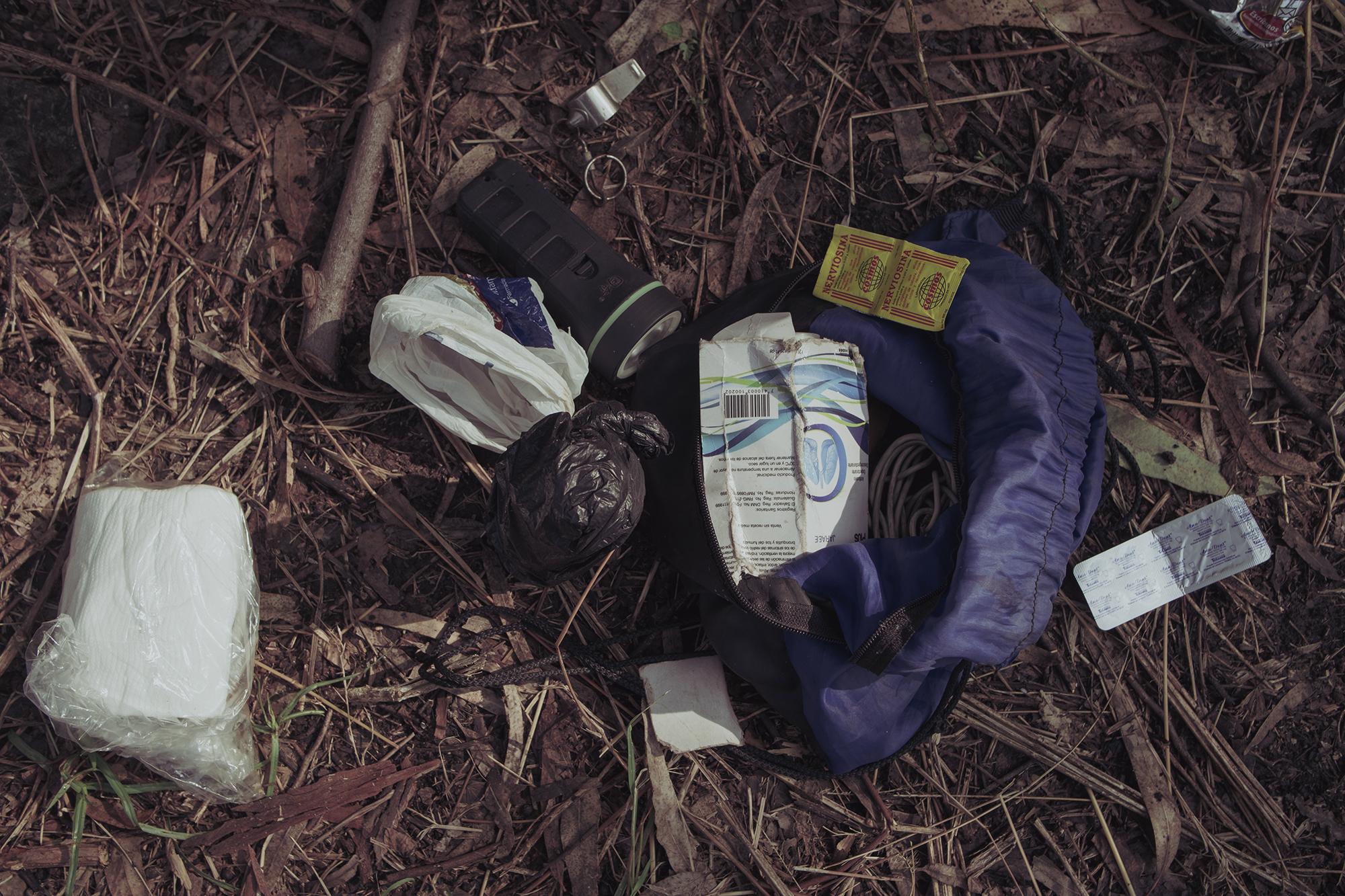 Cough syrup, painkillers, paper, a flashlight, and a whistle belonging to José Darío Argueta, 74. “The whistle is in case something happens and I have an emergency, and also to warn my neighbors of any danger,” he said. Residents have organized a community watch program to keep the area safe. 