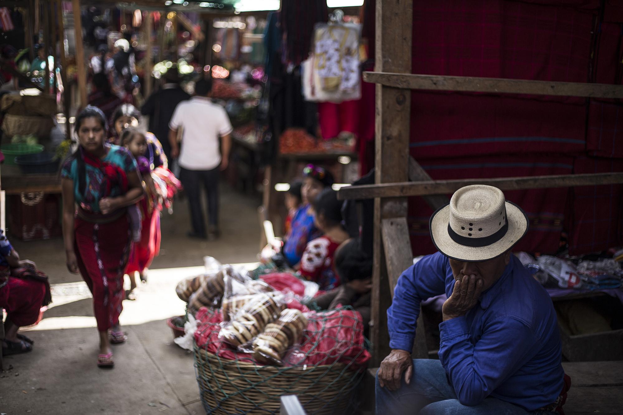 As of 2008, 10 percent of Chajul’s population had migrated to Cobán in search of work on coffee plantations, or to southern Guatemala, to work on sugar cane farms. Among that percentage are also those who migrated to the United States. Many who remain, like those in the image above, make their living selling handicrafts that they make themselves.