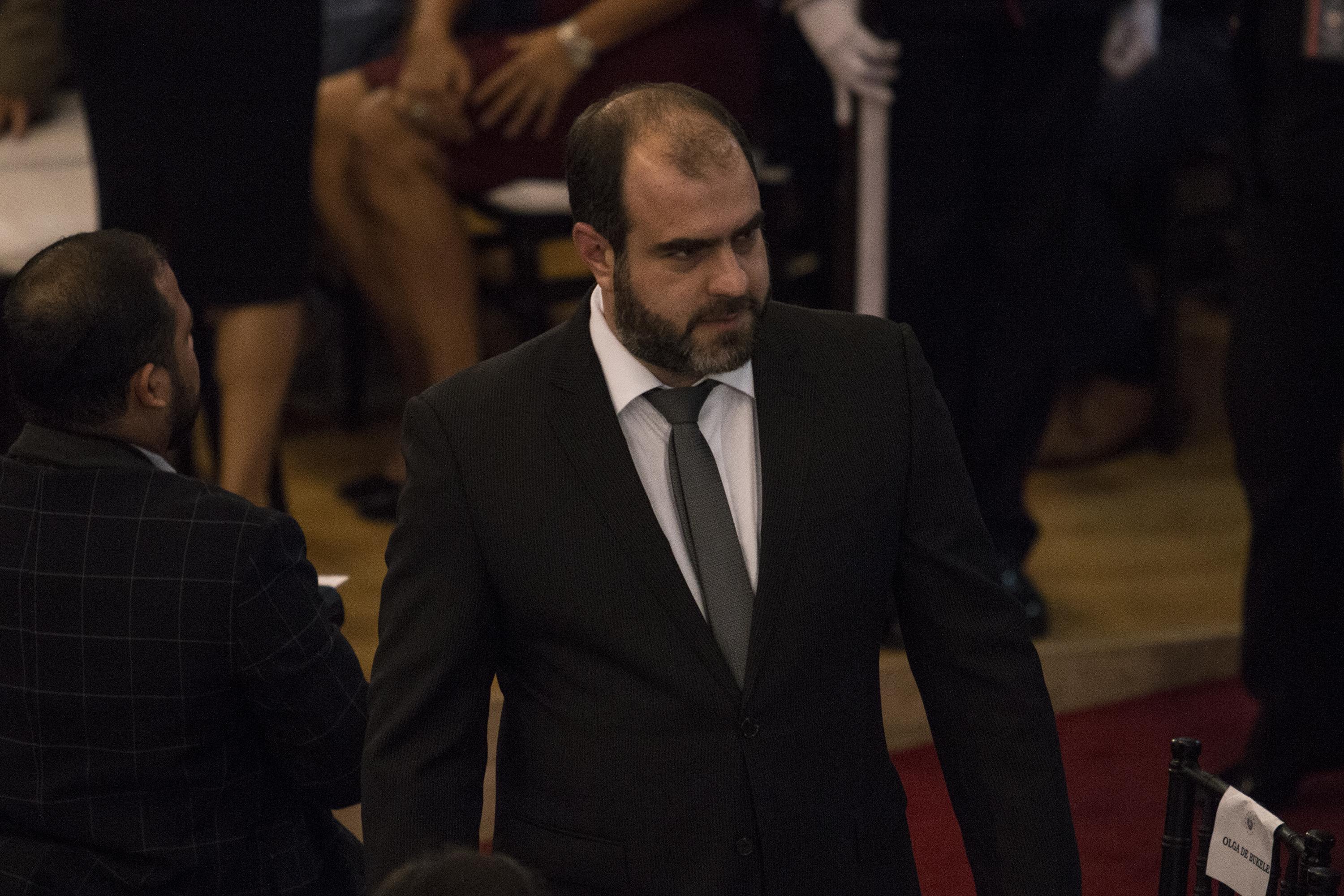 Juan Carlos Bidegain, ministro de Gobernación de El Salvador, durante la ceremonia de rendición de cuentas del trecer año de gobierno de Nayib Bukele, realizado el 1 de junio de 2022, en el Salón Azul de la Asamblea Legislativa. Foto de El Faro: Víctor Peña. 