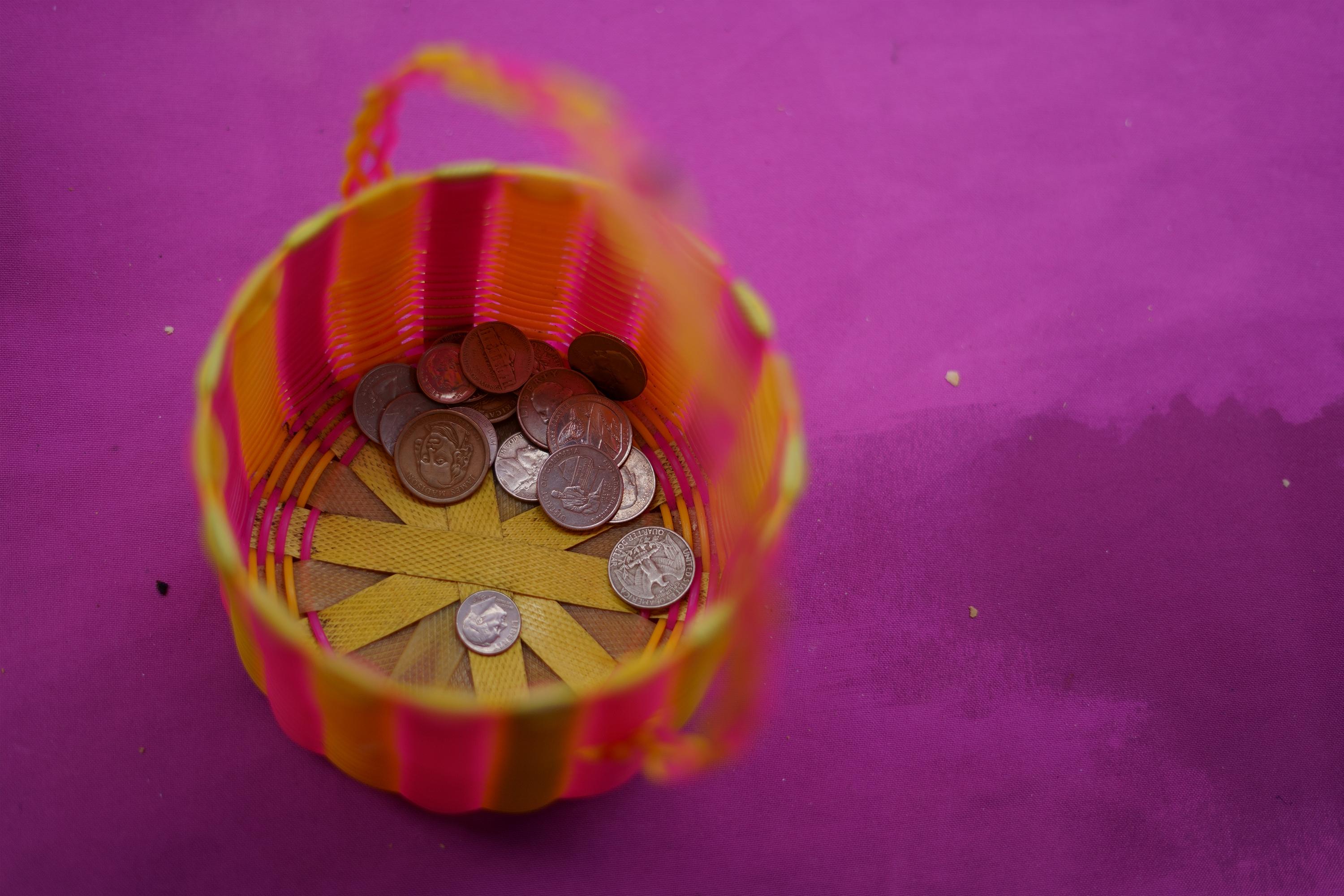 Ángela, 55, collects her coins in this little basket. Her son was detained on April 6 in Distrito Italia, Tonacatepeque, and ever since, she has traveled to Izalco Prison every day hoping to find news of him. “Every day people leave this place wounded or dead,” she says. “I need to be here, to keep an eye out for my son.” Angela sells the clear plastic bags used to make packages for prisoners. What she earns, she spends on the $6.00 it costs her to travel to and from the prison. She also works collecting fees for a local homeowner who rents out her bathroom. This guarantees her a spot on the side of the road, in case she needs to spend the night near the prison.