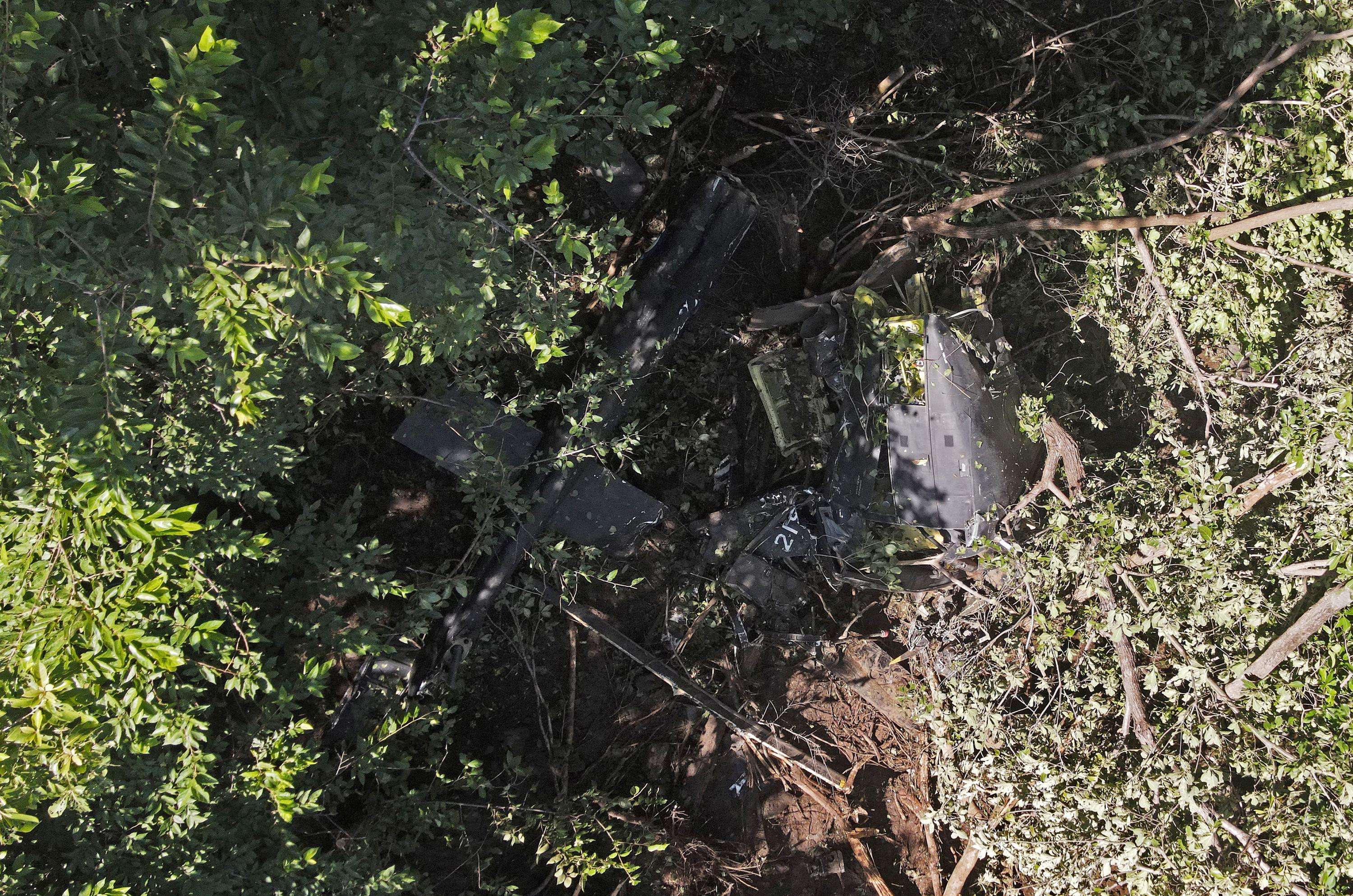 This aerial view shows the wreckage of the military helicopter that crashed in Pasaquina, El Salvador, on Sep. 9, 2024. Police director and leader of anti-gang efforts, Commissioner Mauricio Arriaza Chicas and his companions were killed when the helicopter they were traveling in crashed in northeastern El Salvador, the army said. Photo Marvin Recinos/AFP