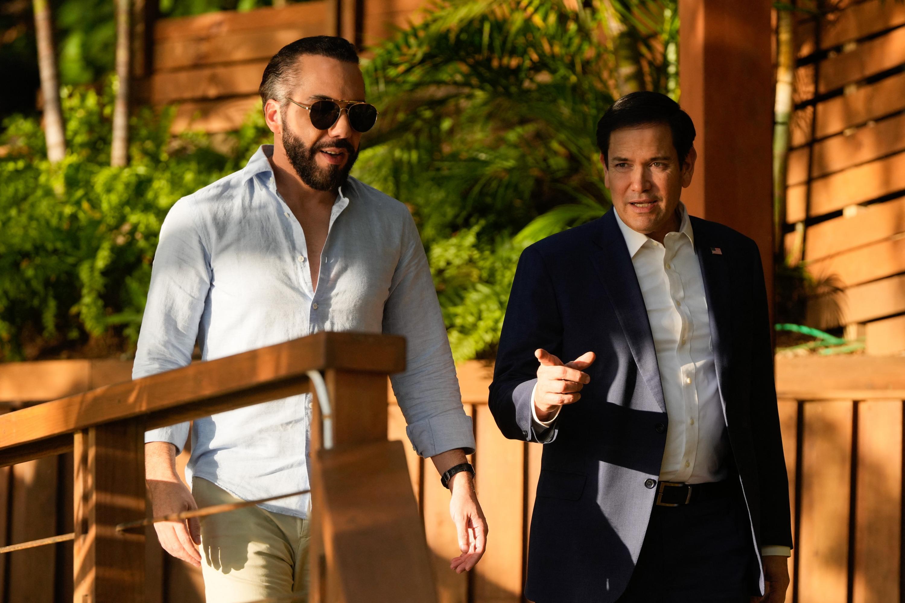 U.S. Secretary of State Marco Rubio (right) meets with Salvadoran President Nayib Bukele at his residence at Lake Coatepeque on Feb. 3, 2025. Photo Mark Schiefelbein/Pool/AFP