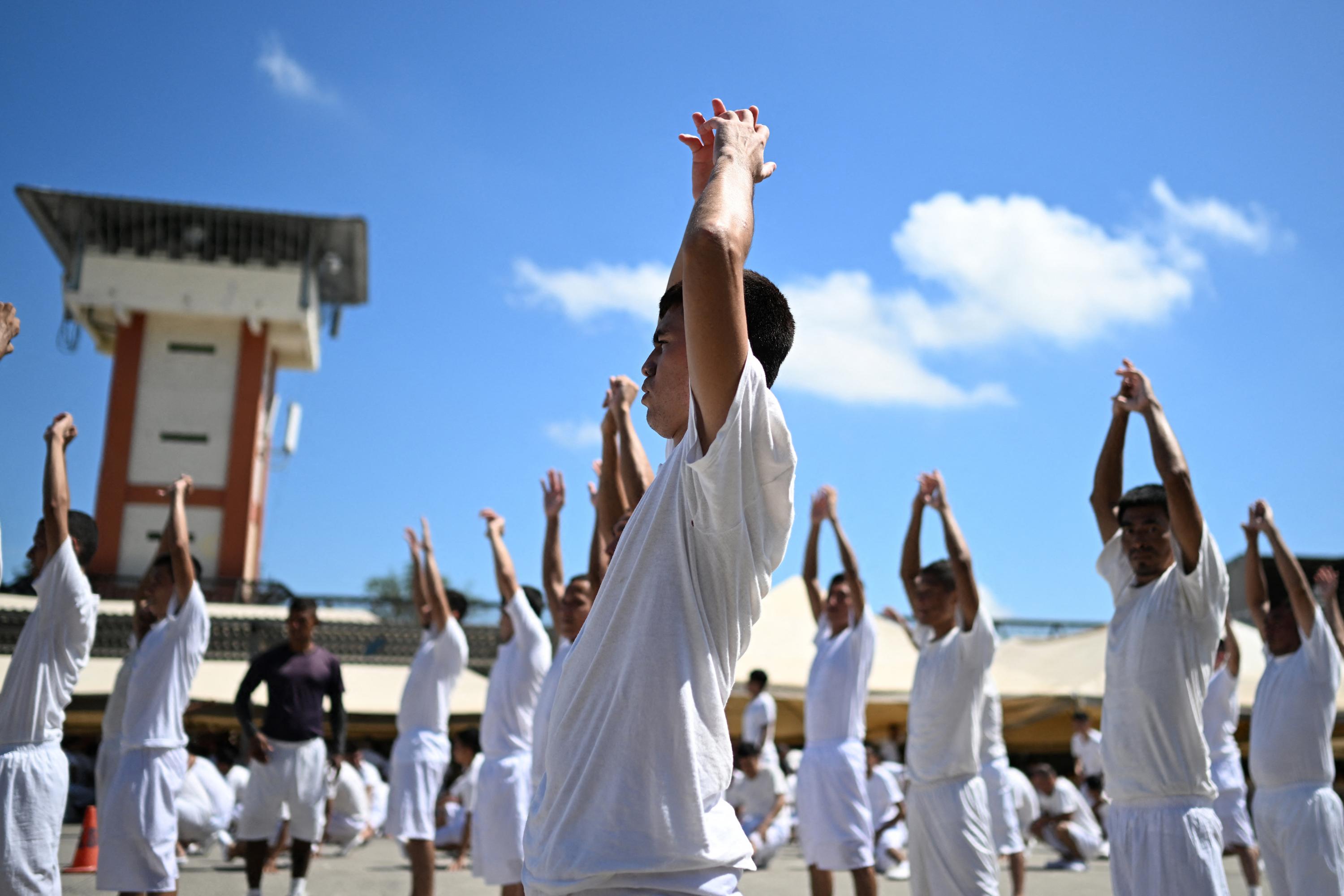 Inmates exercise as part of a government rehabilitation program reserved for non-gang members during a press tour in La Esperanza Prison, also known as Mariona, on Aug. 29, 2024. Photo Marvin Recinos/AFP