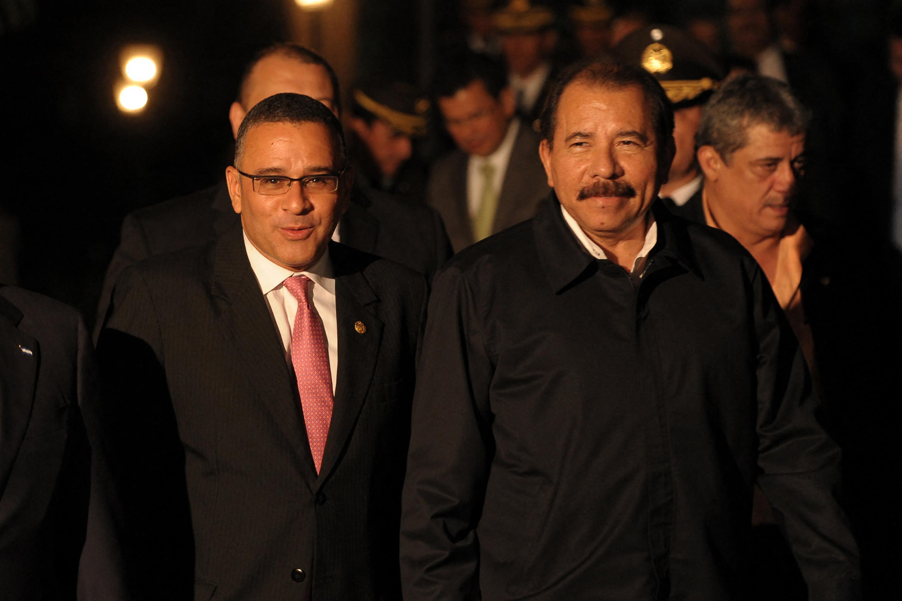 Salvadoran President Mauricio Funes and Nicaraguan President Daniel Ortega walk to a press conference after a meeting on the development of the Gulf of Fonseca on Mar. 30, 2012, in San Salvador. Photo José Cabezas/AFP