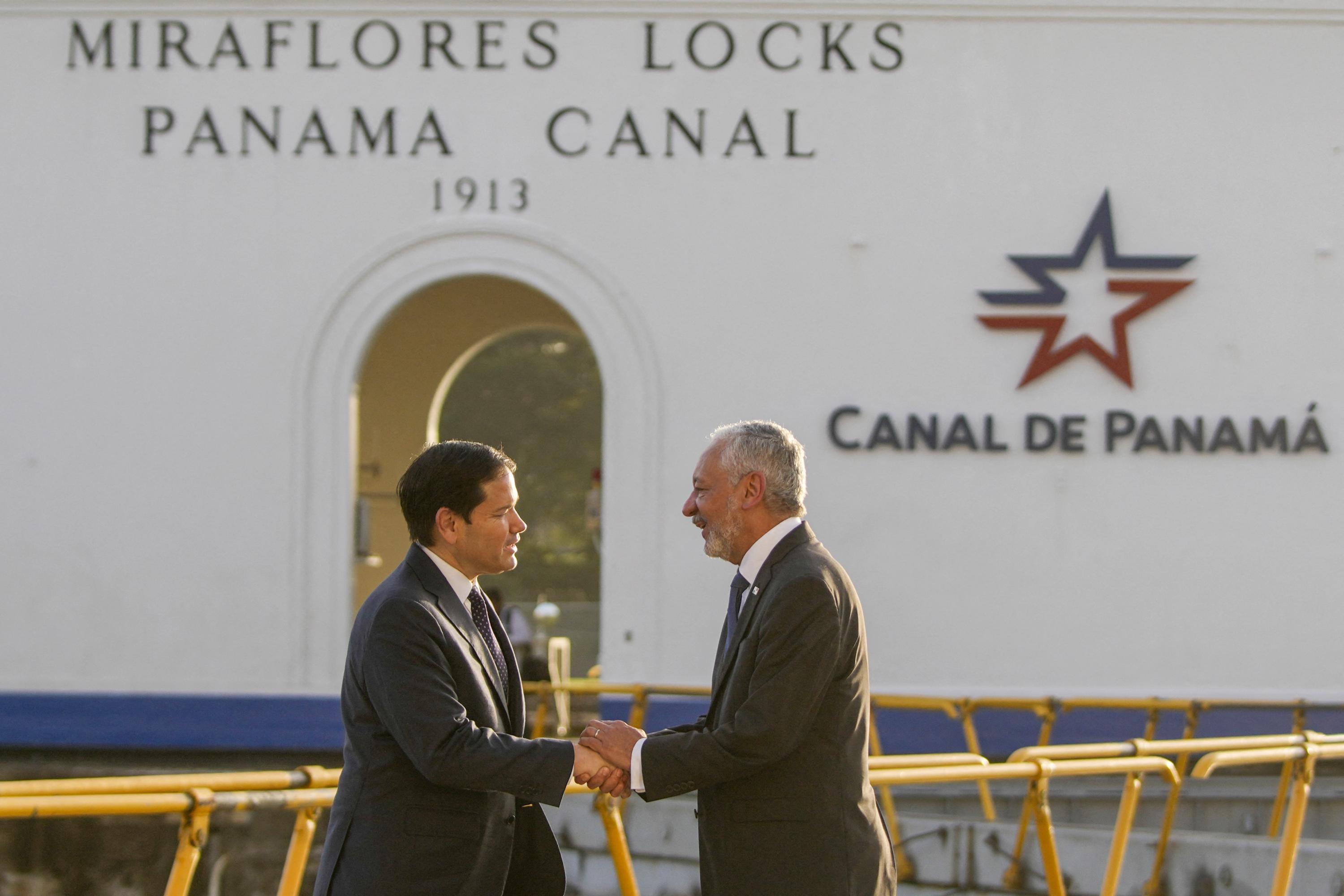 U.S. Secretary of State Marco Rubio (left) shakes hands with Panama Canal Authority Administrator Ricaurte Vásquez during a tour at the Miraflores locks of the Panama Canal on Feb. 2, 2025. Photo Mark Schiefelbein/Pool/AFP