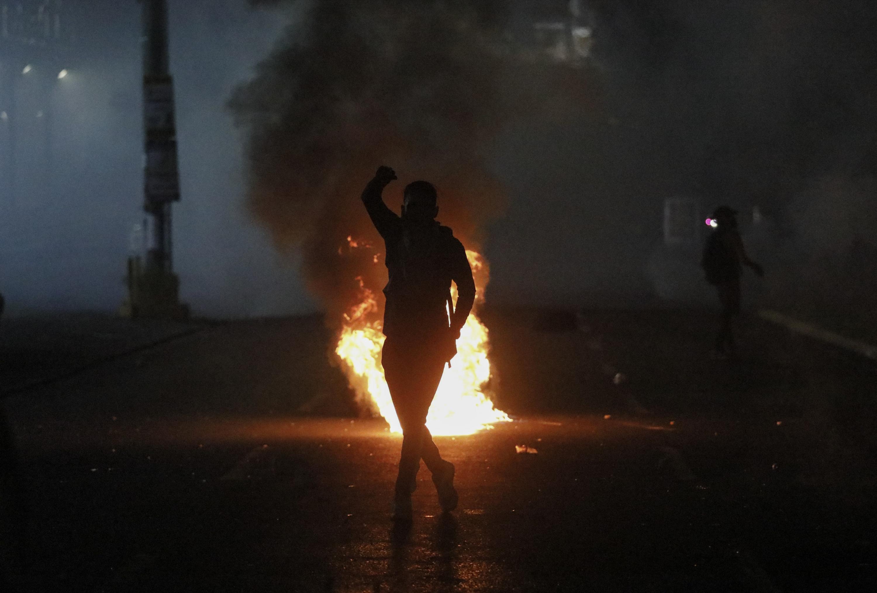 Demonstrators clash with riot police during a protest against the contract for the Canadian mining company FQM in Panama City on Oct. 25, 2023. Protesters in the capital and other provinces condemned environmental damage from operations at the mine, one of the biggest copper extractors in the world. Photo Roberto Cisneros/AFP