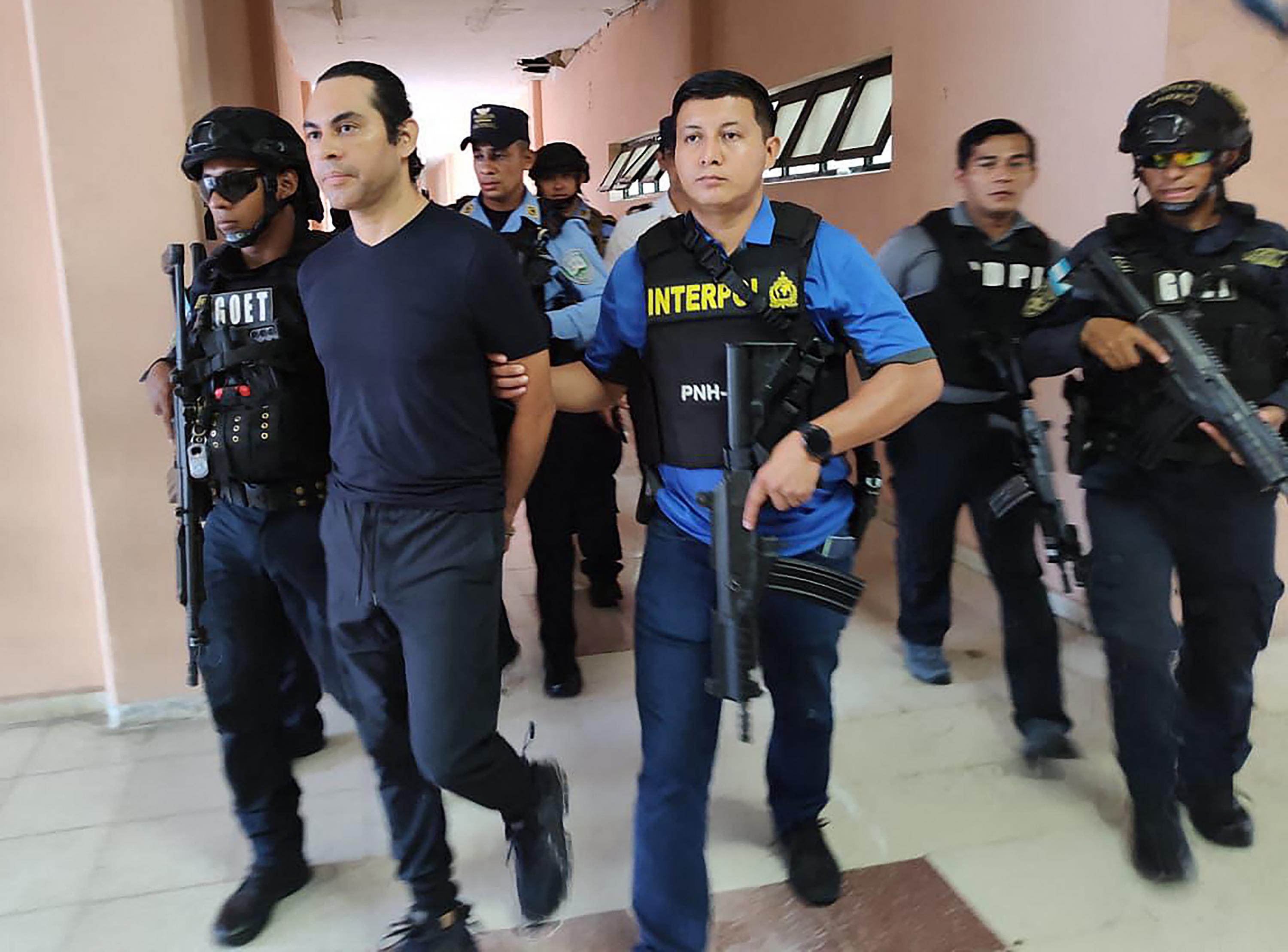 Picture released on Sep. 9, 2024, by the Honduran National Police showing banker Manuel Coto Barrientos being removed to El Salvador in Choluteca, Honduras. He was killed hours later in a helicopter crash along with several senior Salvadoran police officials, including Commissioner Mauricio Arriaza Chicas, the army said on September 9. Photo AFP