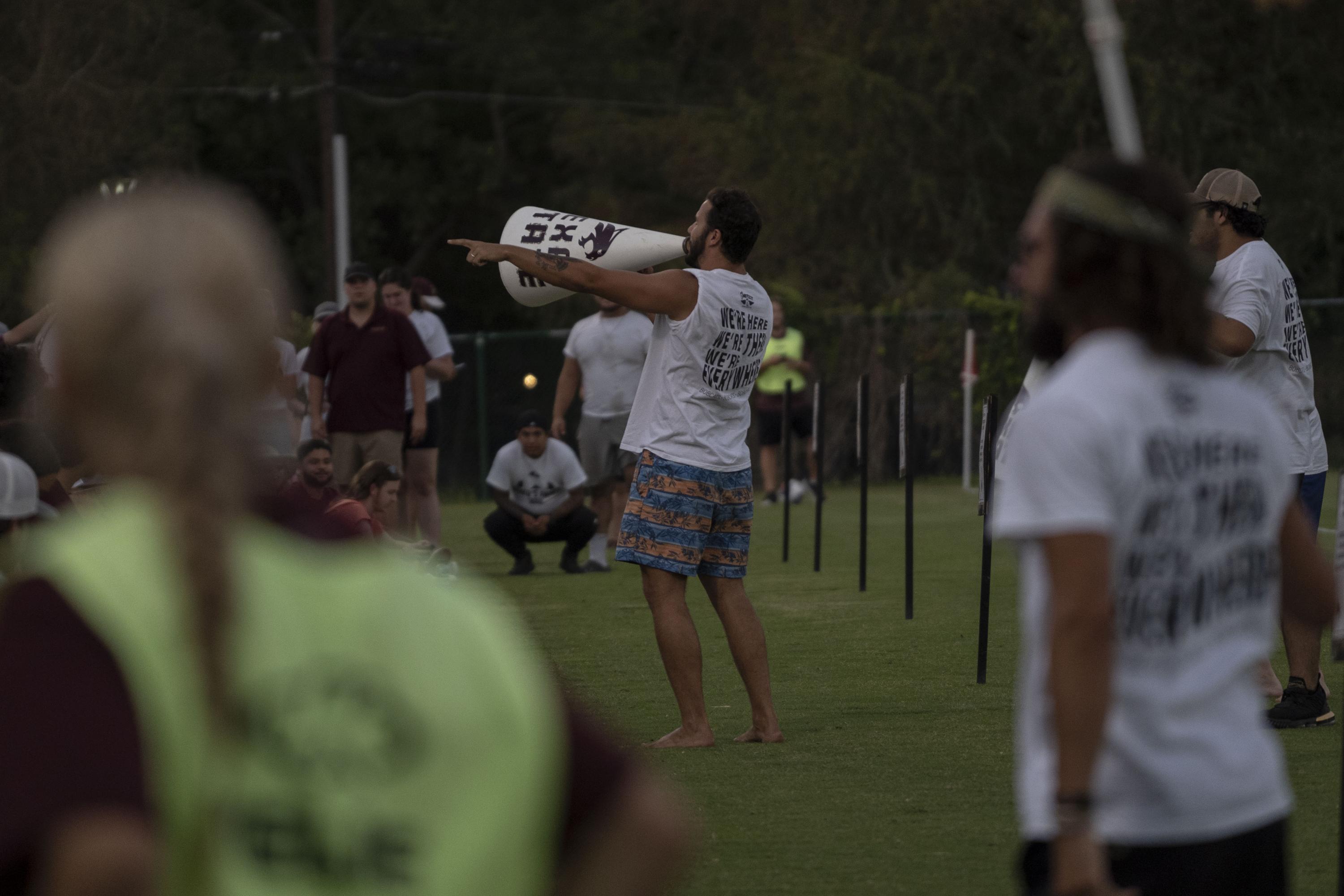 A small crowd of college students cheers during Texas State home games. The playful atmosphere has nothing in common with Central America’s raucous bleachers.