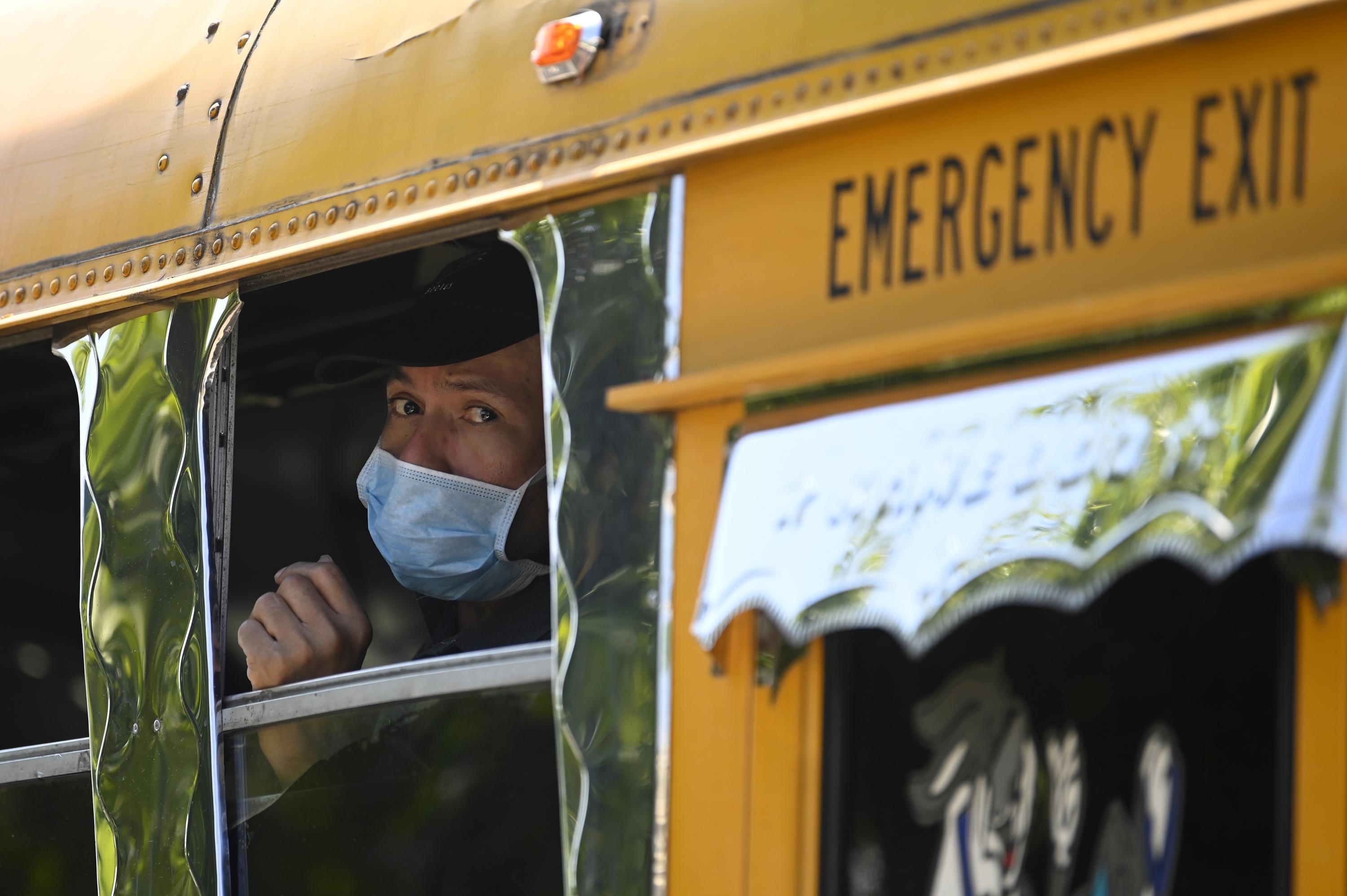 A Salvadoran passenger who arrived on Saturday, March 14 at the Monsenor Romero International Airport is transferred to a quarantine shelter in Jiquilisco, Usulutan. Photo by Marvin Recinos/AFP