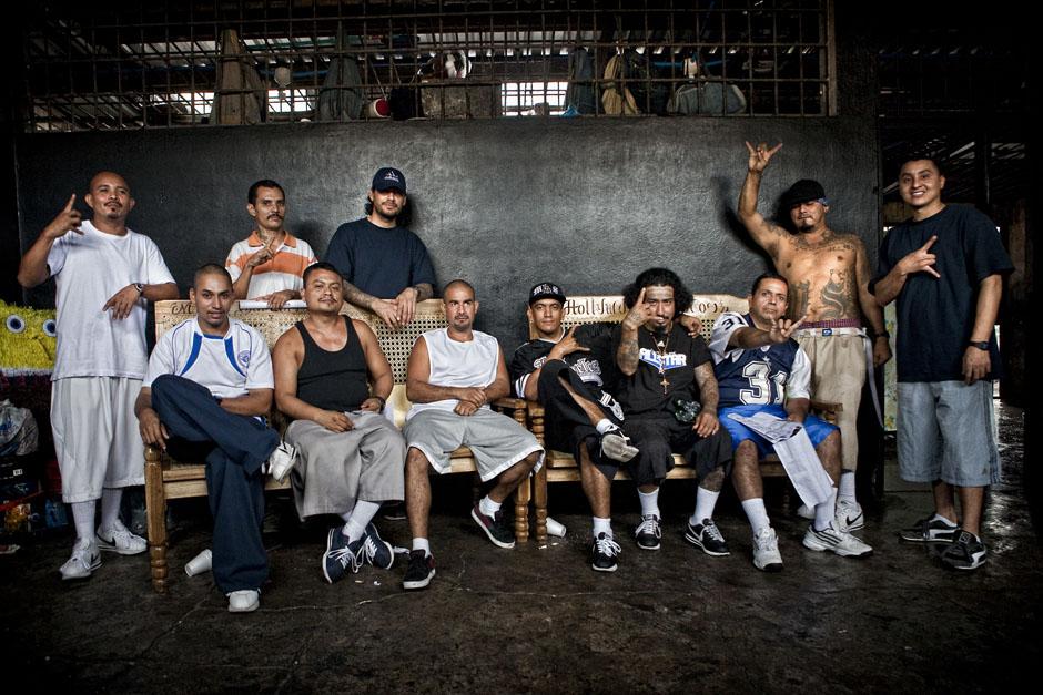 Leaders of the MS-13 street gang in the Ciudad Barrios prison in 2012. The gang’s supposed chief executive, Marvin Ramos Quintanilla, is on the far right, and its senior national leader, Borromeo Henríquez Solórzano, known as El Diablito de Hollywood, is seated and wearing a black cap. Paul Coll/Ruido Photo