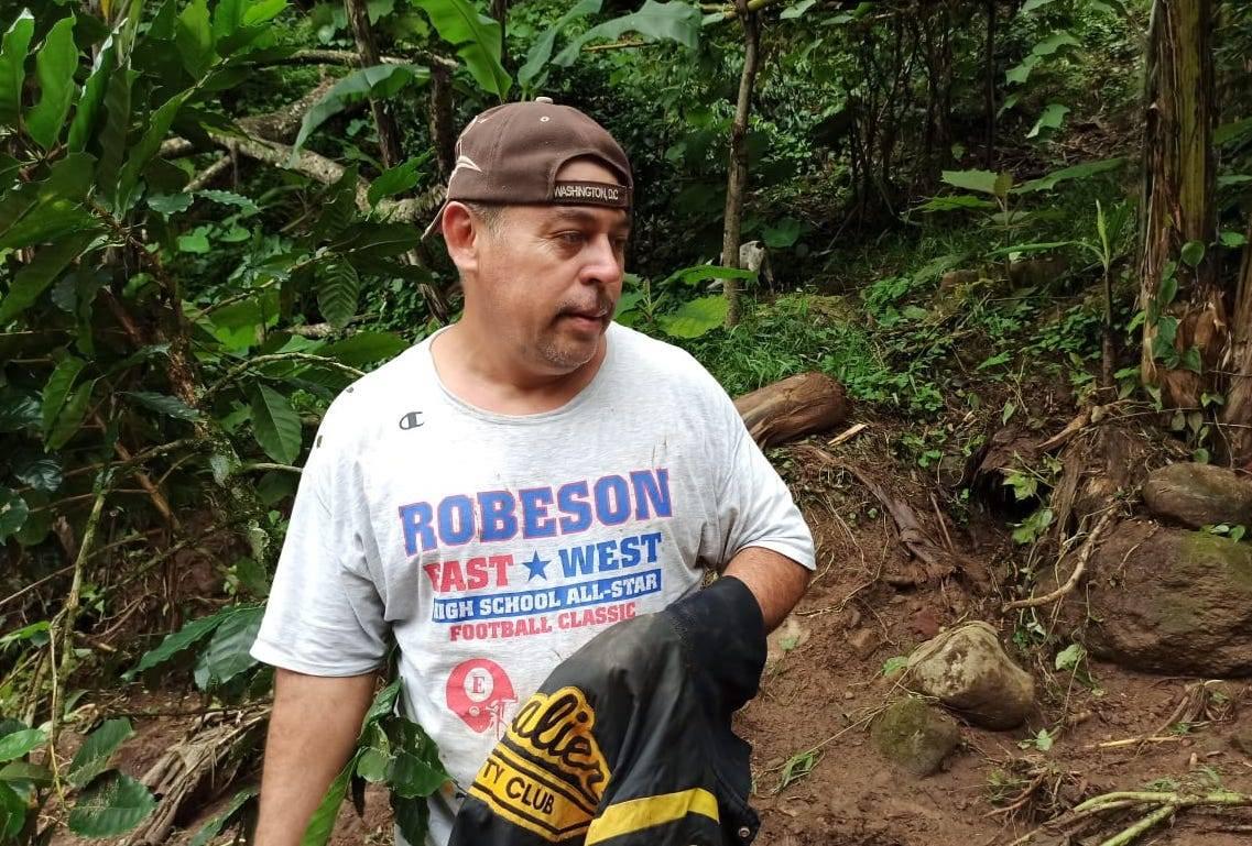 Terencio Pérez, a small-scale coffee farmer in Macizo de Peñas Blancas, at the site of the tragedy.