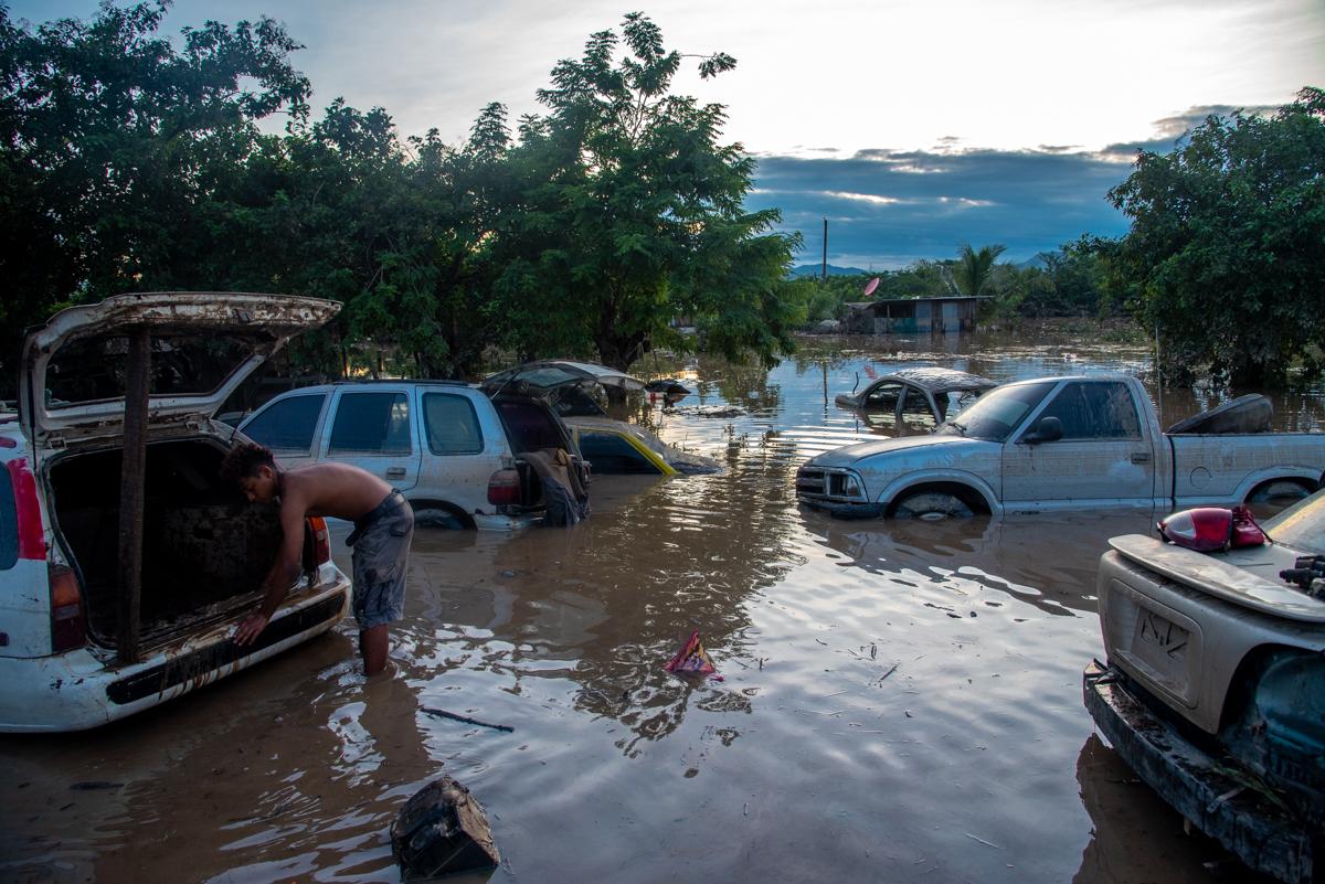 Flooded cars along a highway in San Pedro Sula, Honduras, days after Hurricane Eta hit the region.