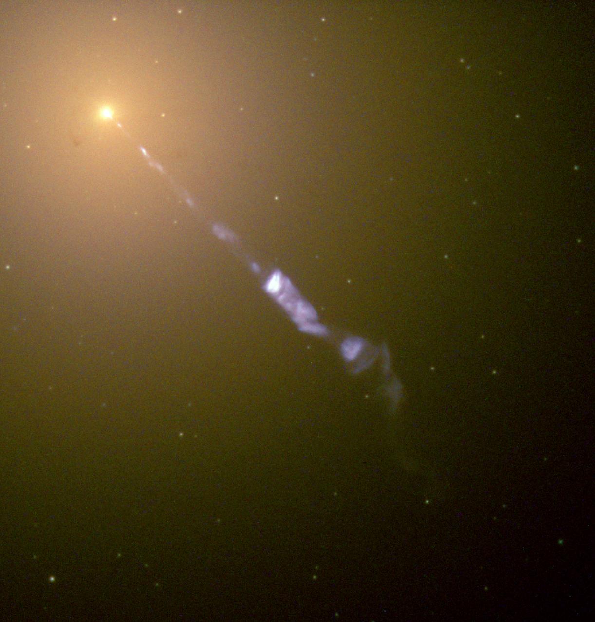 Chorro de plasma del núcleo de la Galaxia M87. Imagen de Hubble Heritage Team (STScI /AURA), NASA.