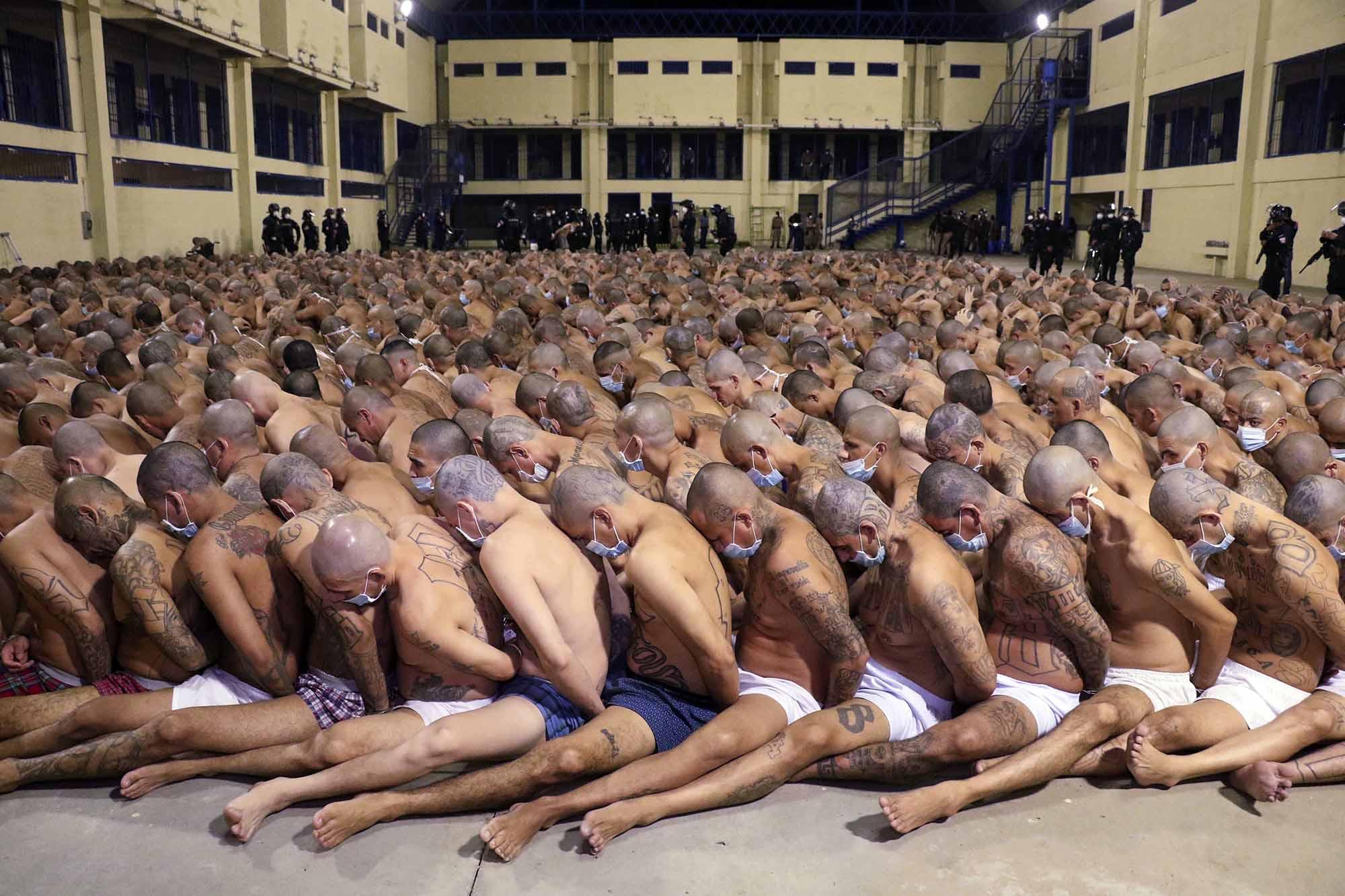 Prisoners in the Izalco Penitentiary arranged in lines during an operation. There had been 60 murders in three days across El Salvador—an uptick in violence that, according to the government, the gangs orchestrated from behind bars. Photo: Directorate General of Prisons