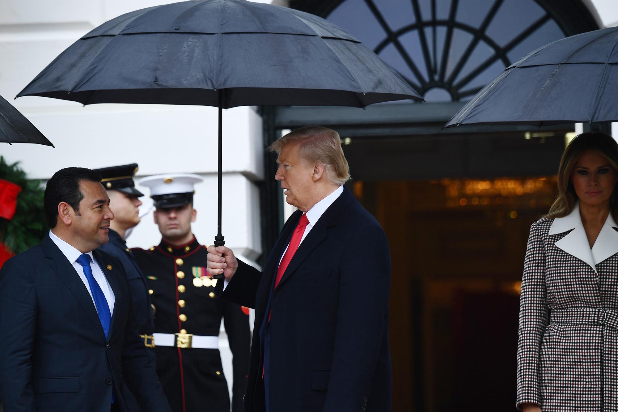 US President Donald Trump and First Lady Melania Trump  participate in the arrival of Guatemala