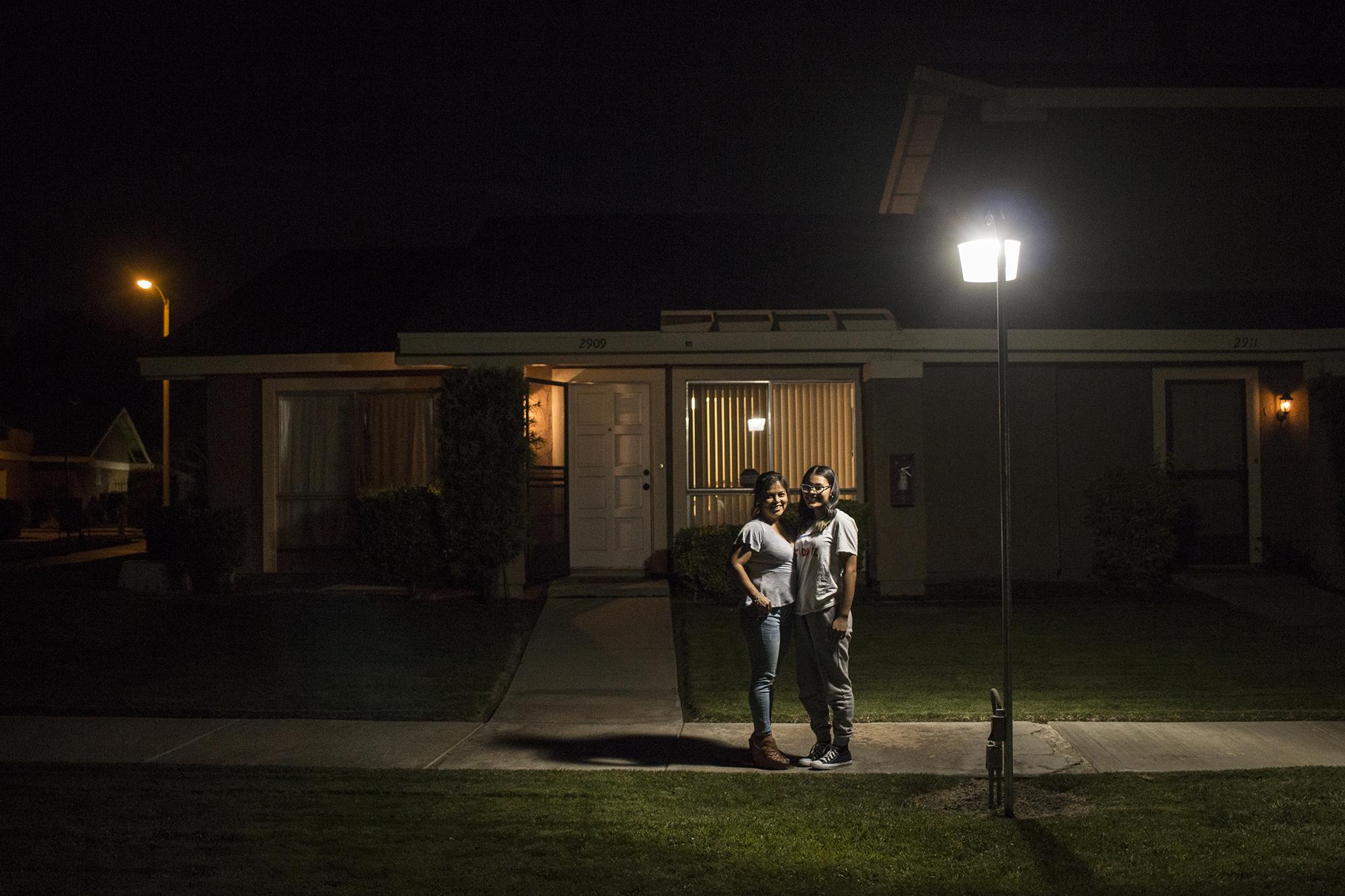 Desireé Ramírez, 47, with her daughter Gisselle Calvillo, 17, at their home in Lancaster, California. Desirée migrated in the 80s at just 6 years old. She crossed the border undocumented with her mother and grew up in Los Angeles. Now she manages a school. Her son Erick, born in the United States, plays for La Selecta. “I'm conscious of my position in this country relative to other migrants. My children aren't Mexican or Salvadoran. They're American children of a Mexican father and Salvadoran mother,” she says.