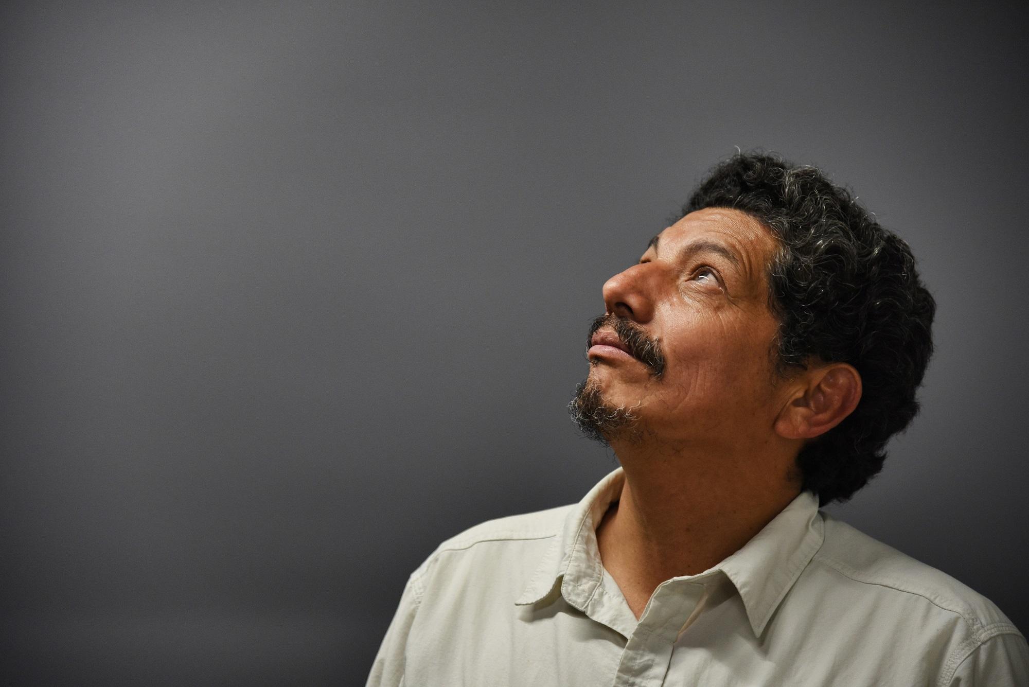Yuri Cortez, fotógrafo salvadoreño que trabaja para la agencia AFP. Foto Bernardo Montoya (AFP).