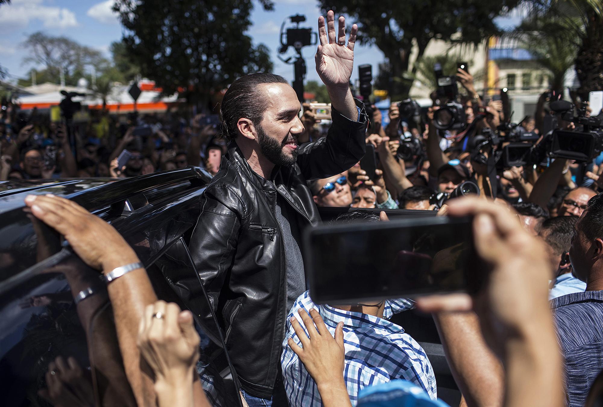 Then-presidential candidate Nayib Bukele greets supporters in San Salvador on election day in February 3, 2019. The popular candidate went on to sweep the elections without a runoff, garnering 53 percent of the vote outright. Photo: Víctor Peña/El Faro