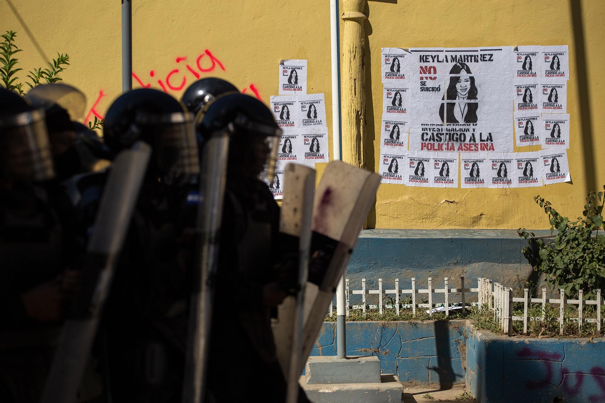 Posters of Keyla Martínez’s face glued to the walls of the police station in Intibucá following the news of her death. La Esperanza, Intibucá, February 8, 2021. Photo: Martín Cálix/Contracorriente