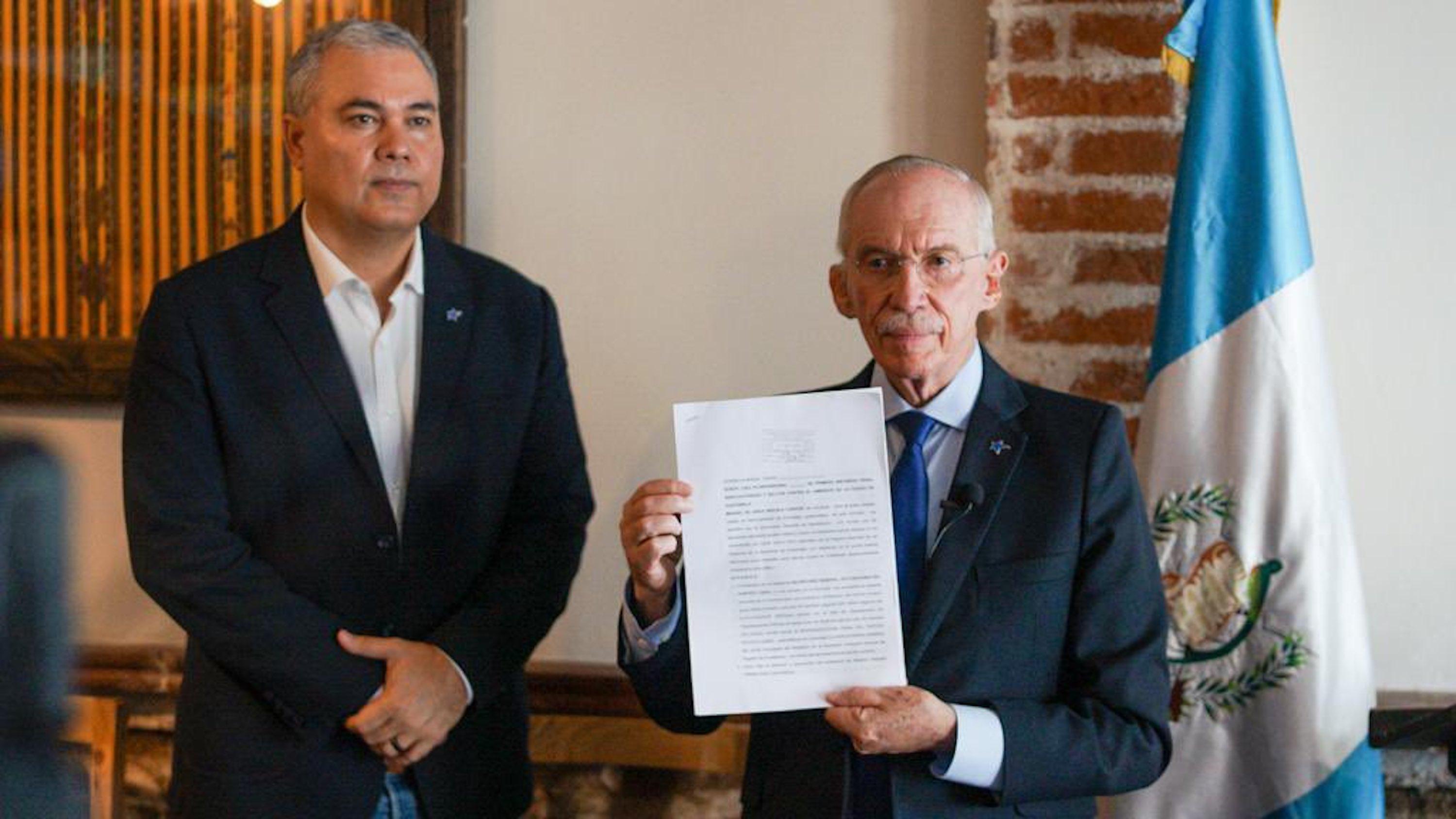 Presidential candidate Edmond Mulet presents an injunction on a Guatemalan court