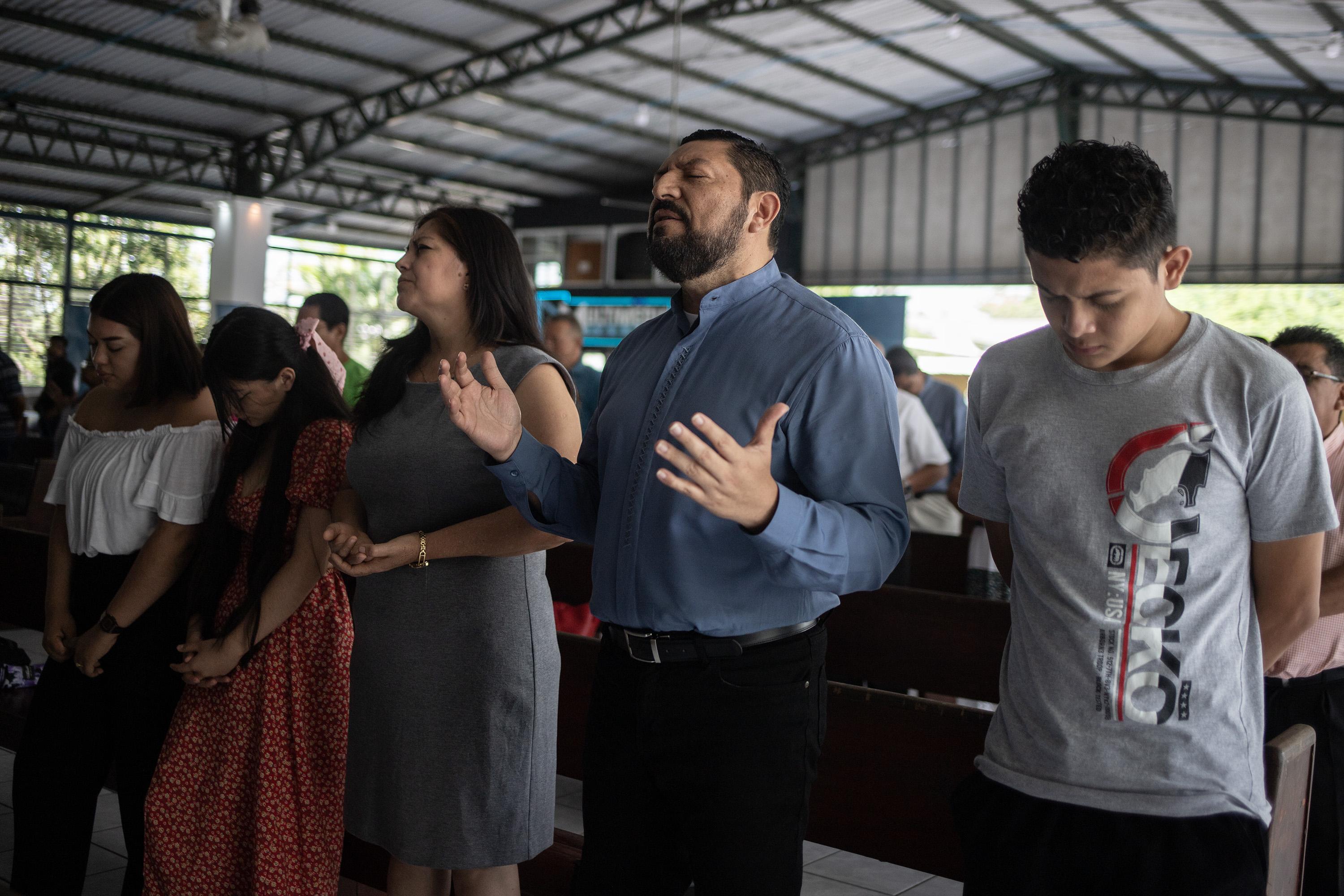 Alexander Guzmán attends services several days a week at the Templo Evangelístico de las Asambleas de Dios, an evangelical church in San Bartolo, Ilopango. Photo Carlos Barrera