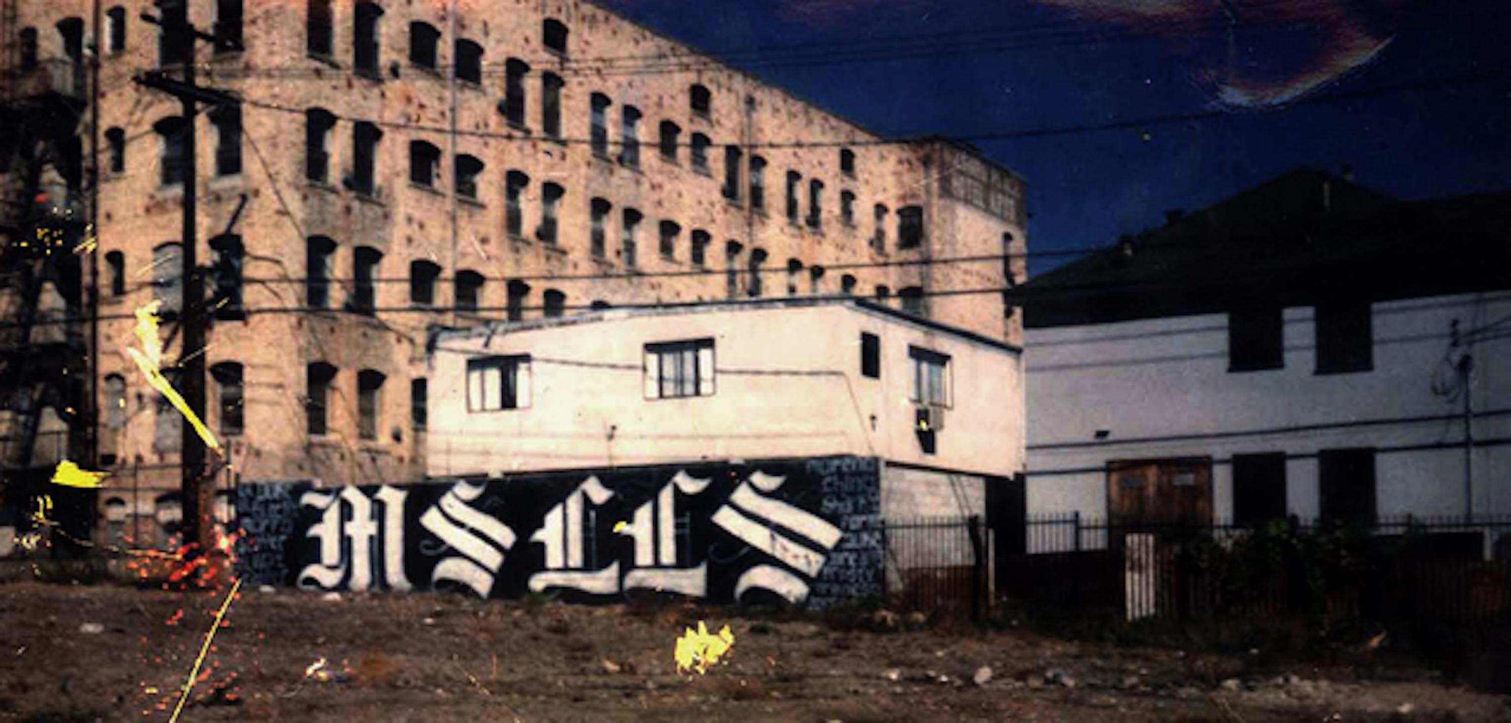Mural painted by the Leeward Locos clique of the Mara Salvatrucha on the back end of Leeward Avenue in Los Angeles, between Westmoreland and Hoover Streets. Photograph taken in the second half of the eighties.