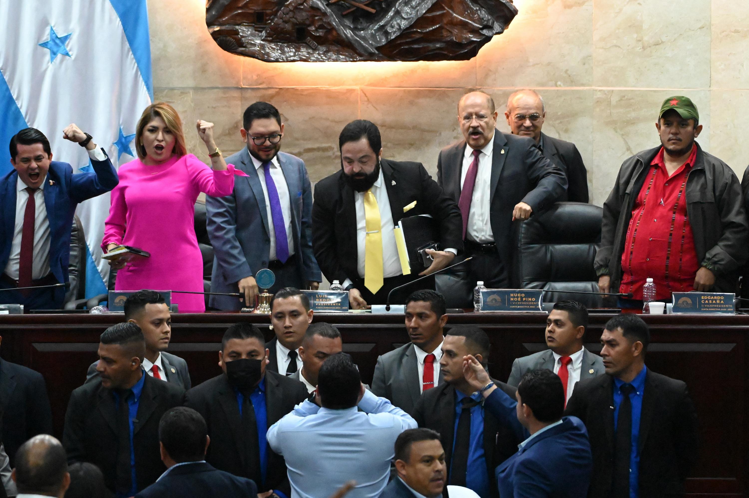 Legislators of the ruling party Libre shout slogans after failing to achieve in ordinary session the appointment of a new attorney general and deputy attorney general of Honduras in Tegucigalpa on August 31, 2023. Photo Orlando Sierra/AFP