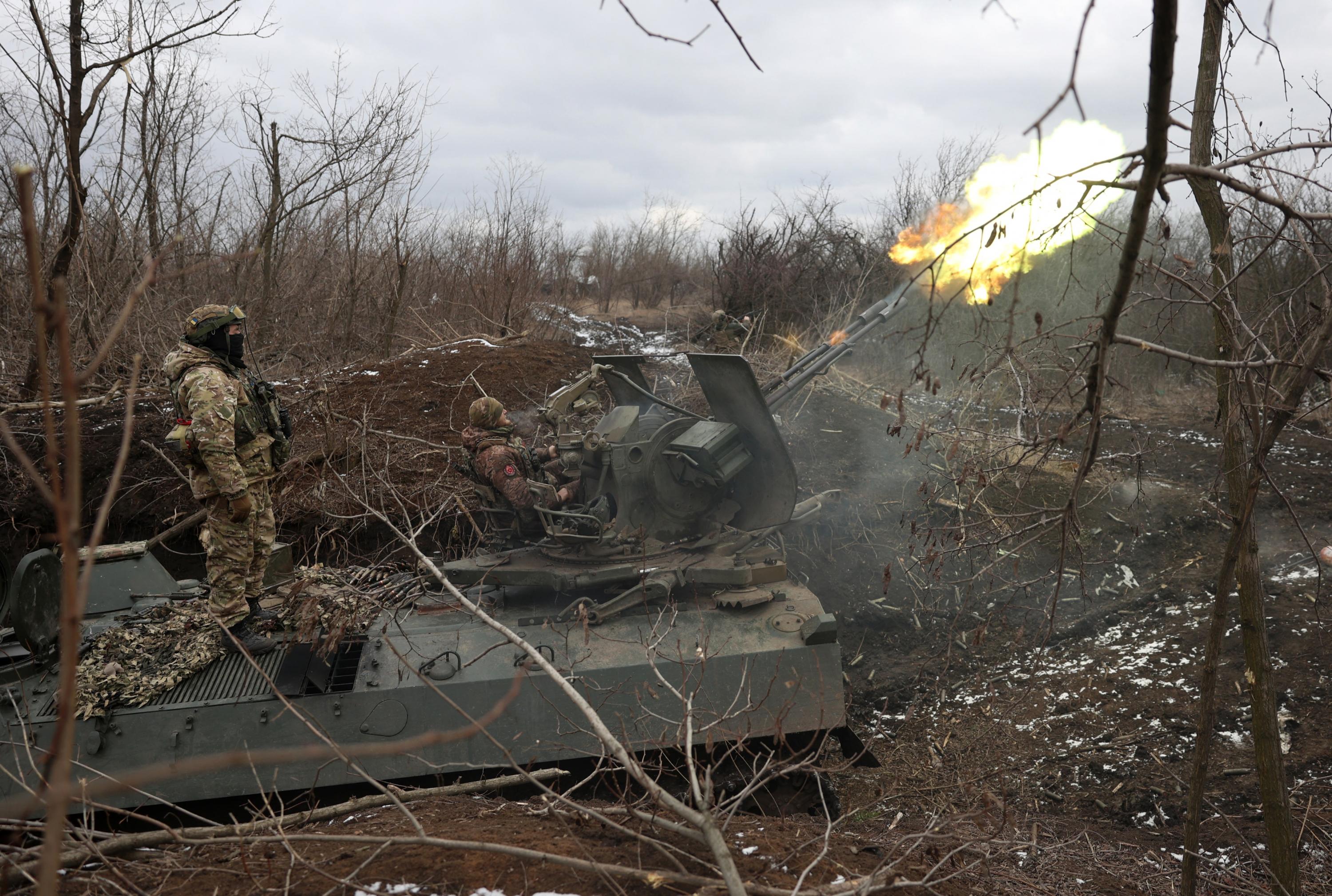 Ukrainian anti-aircraft gunners of the 93rd Separate Mechanized Brigade Kholodny Yar fire at enemy UAVs from their positions in the direction of Bakhmut in the Donetsk region, amid the Russian invasion of Ukraine, on February 20, 2024. Photo Anatolii Stepanov/AFP