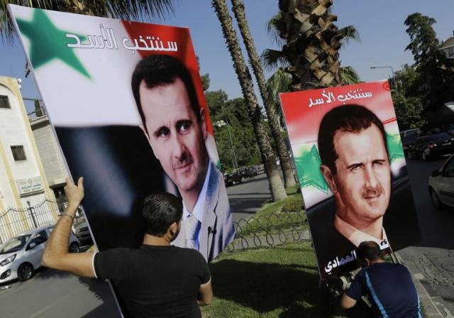 El omnipresente rostro del presidente sirio Bashar al Asad en las calles de Damasco. Ahora quiere sacar partido de que su régimen lleva años combatiendo a los yihadistas del EIIL. Foto archivo El Faro.