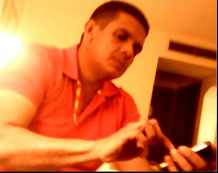 Fabio Lobo en diciembre de 2013, durante una de sus reuniones con narcotraficantes hondureños para negociar el traslado de un cargamento de cocaína destinado al cartel de Sinaloa. En esa reunión, grabada por sus supuestos socios y presentada como prueba judicial, Lobo prometió protección policial al cargamento a cambio de 1.6 millones de dólares.